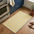 Tapis en coton bio à rayures jaunes