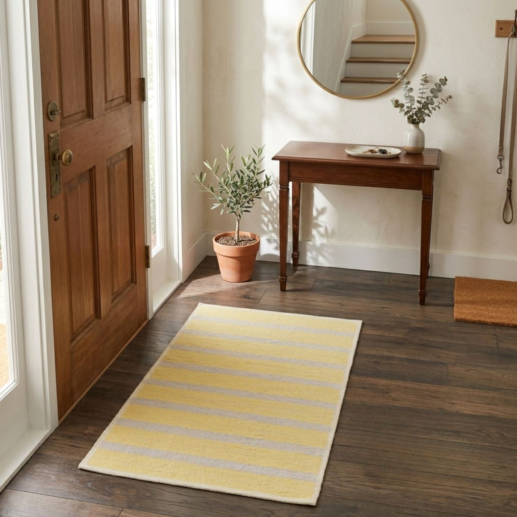 Tapis en coton bio à rayures jaunes